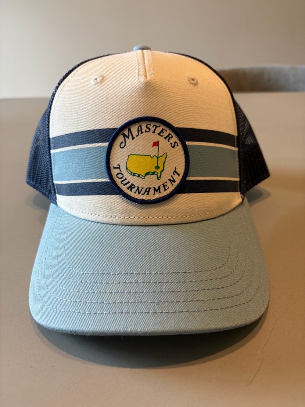 Masters Trucker Hat with Snap-back closure